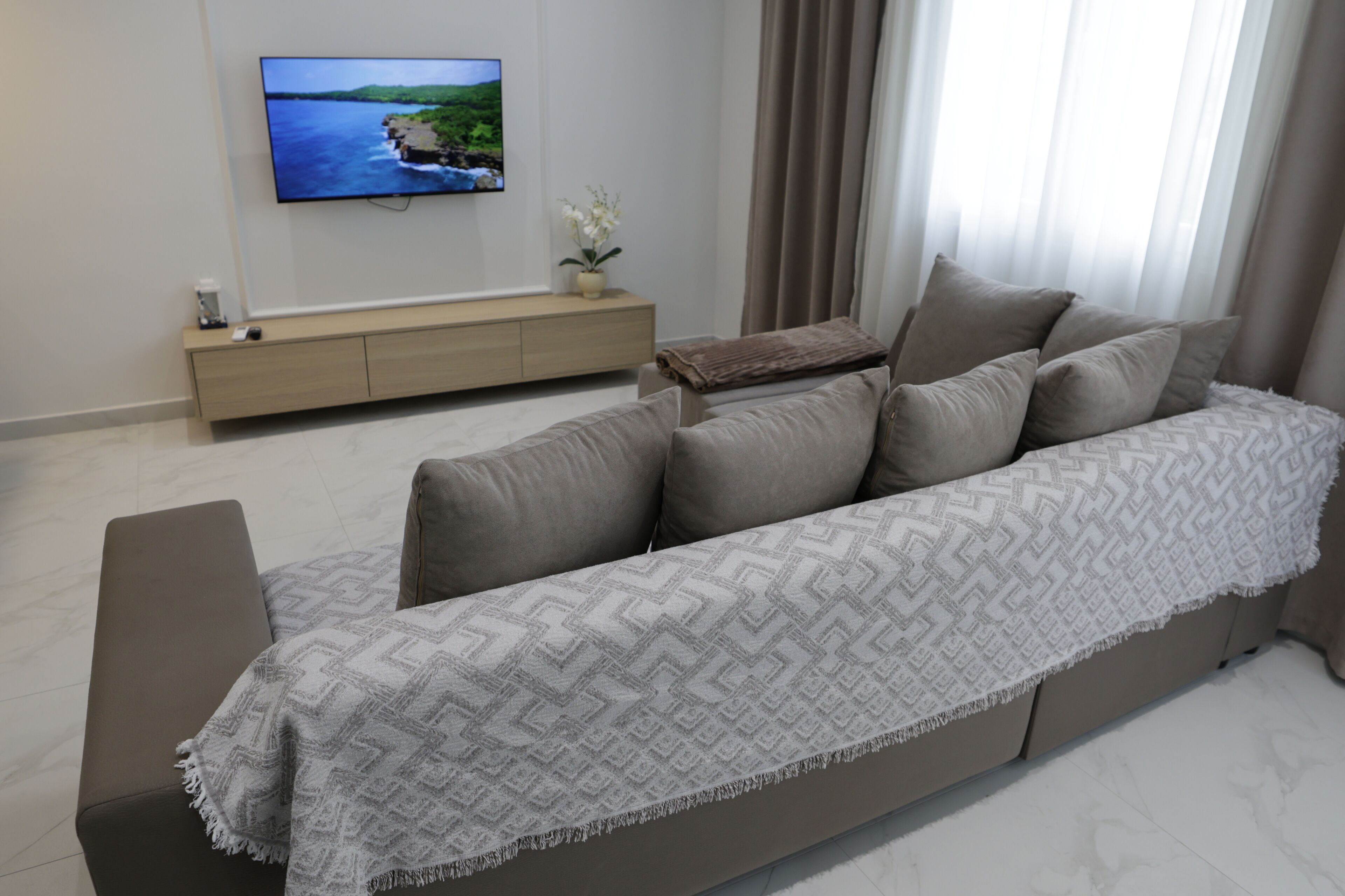 Family Apartment, Balcony | Living area | 100-cm Smart TV with digital channels