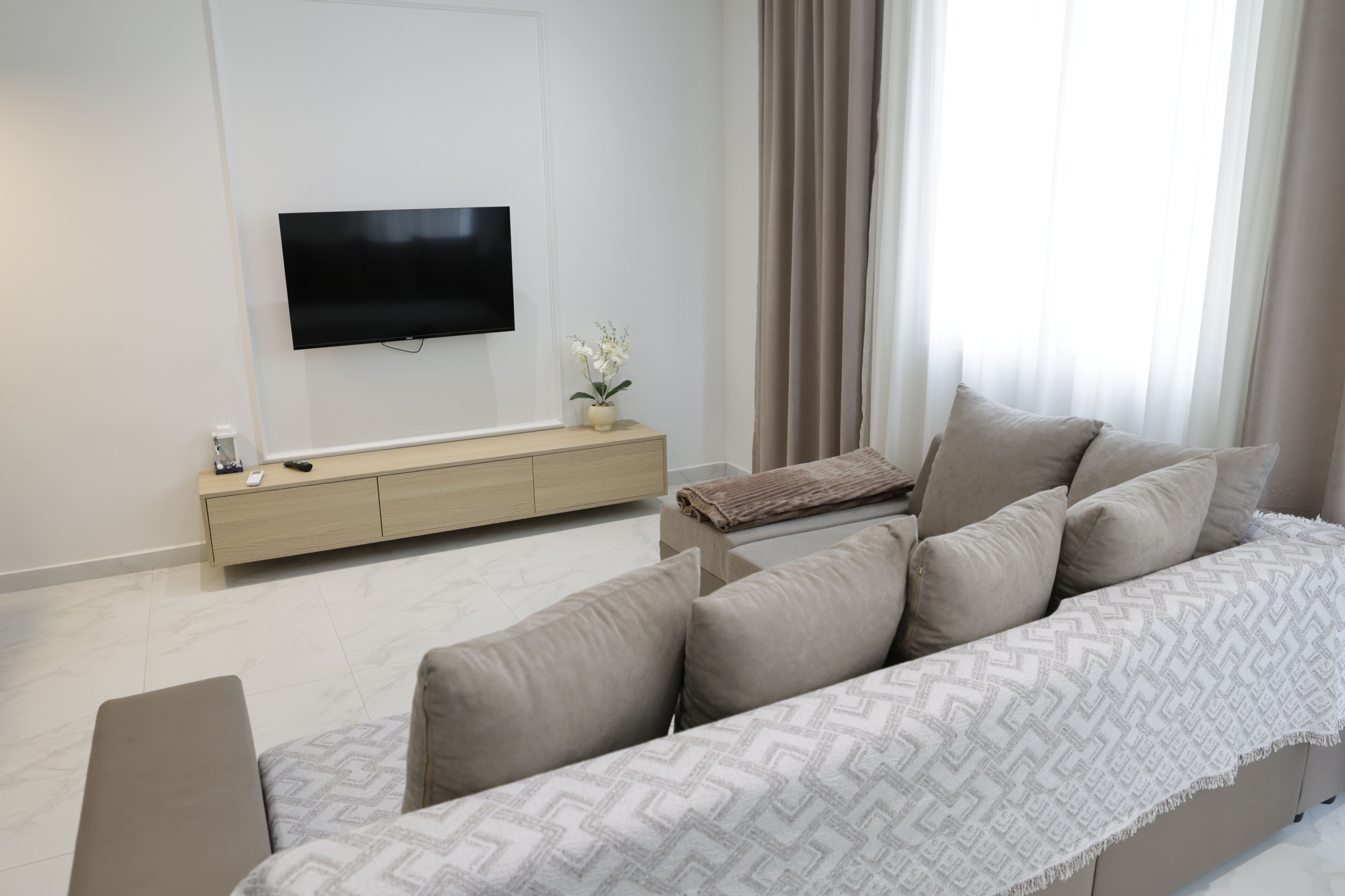 Family Apartment, Balcony | Living area | 100-cm Smart TV with digital channels