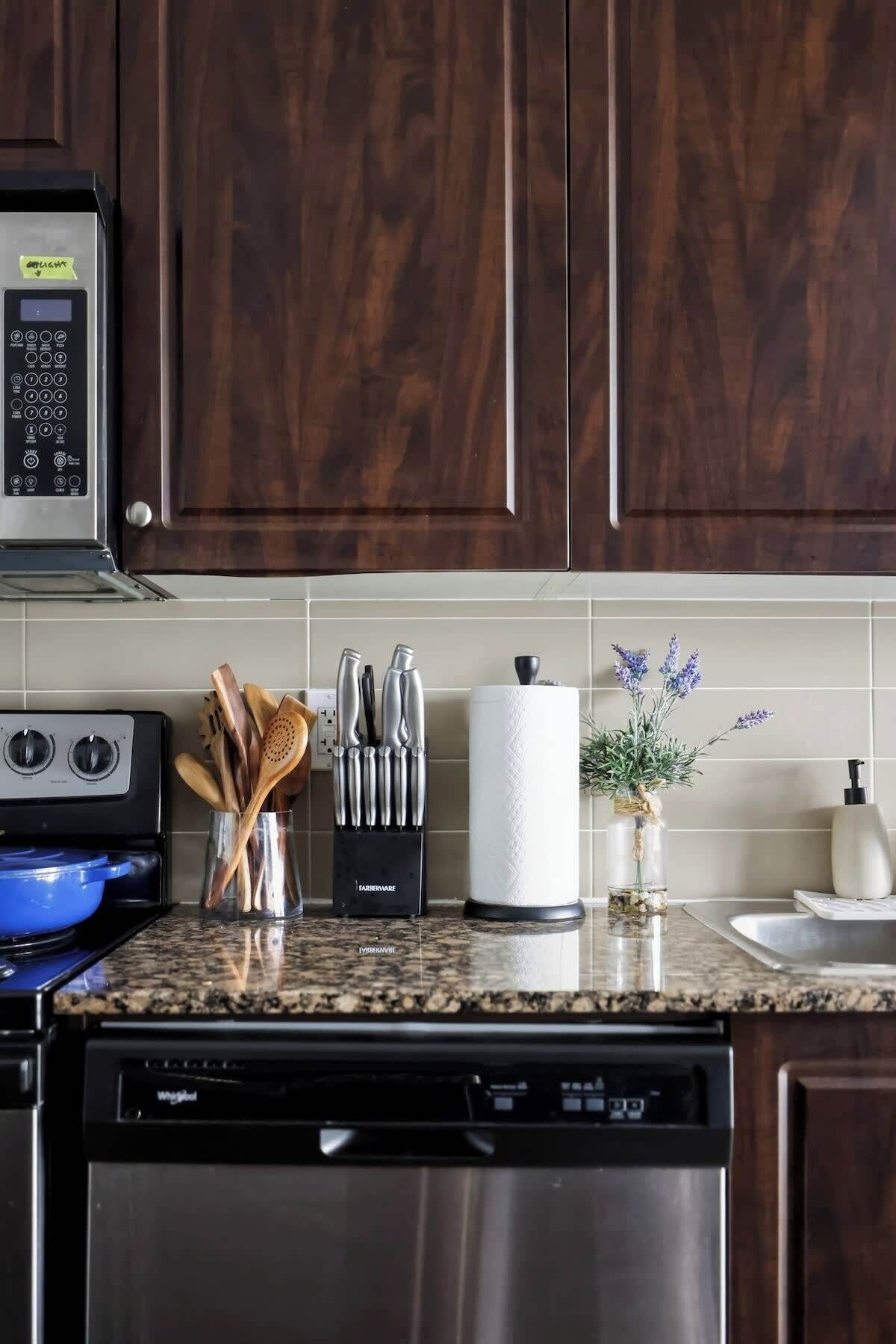 Whip up a meal on the full stove with granite counters and a double sink.
