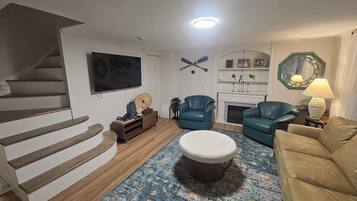 Smart TV, fireplace, books