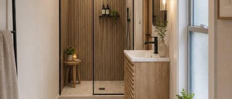 Shower, hair dryer, bidet, towels