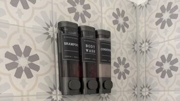 Shower, towels, soap, shampoo