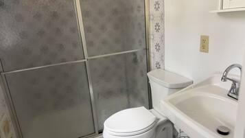 Shower, towels, soap, shampoo