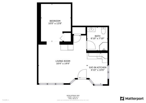 A floor plan of a 1-bedroom apartment with a living room, bedroom, bathroom, and eat-in kitchen.