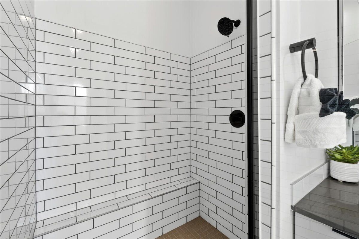 Triple Room | Bathroom | Shower, hair dryer, towels, soap