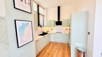 Fridge, oven, electric kettle, toaster