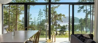 Architect villa by cliff bathing in High Coast