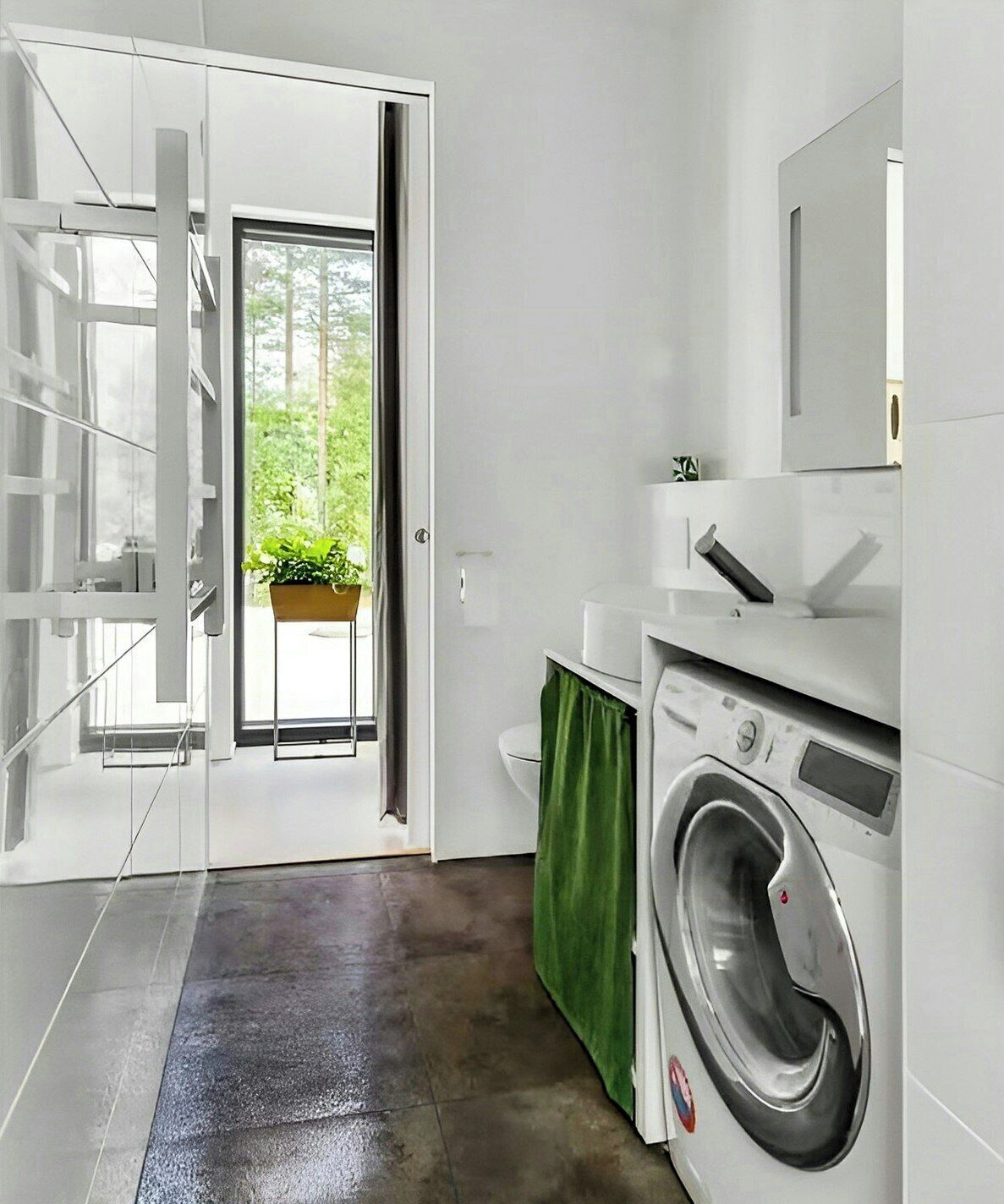 Une buanderie moderne équipée d’un lave-linge, d’un étendoir et d’un rideau vert.