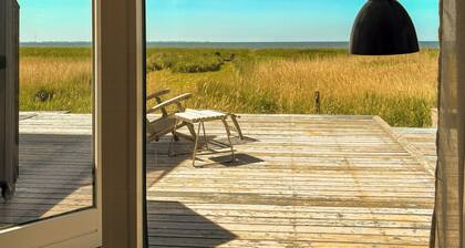 Front row holiday home with sunset on Odden