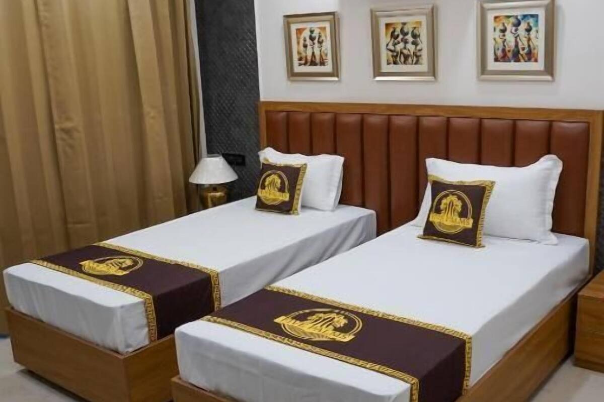 Kamar Twin Deluks, balkon, pemandangan kota | Brankas, kedap suara, dan Wi-Fi gratis