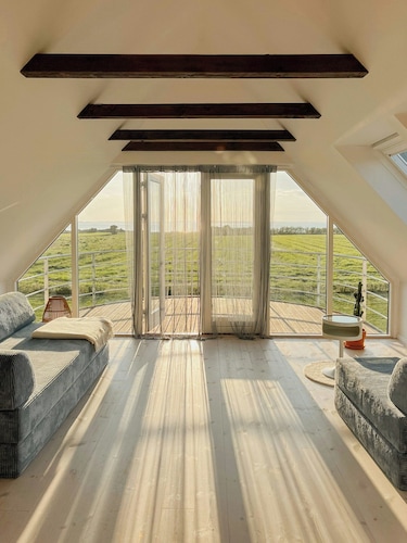 Idyllic thatched cottage with sea view