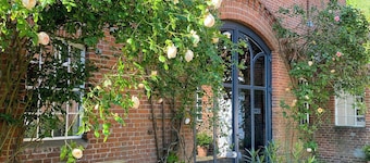 Loft with designer pieces on a former pony farm
