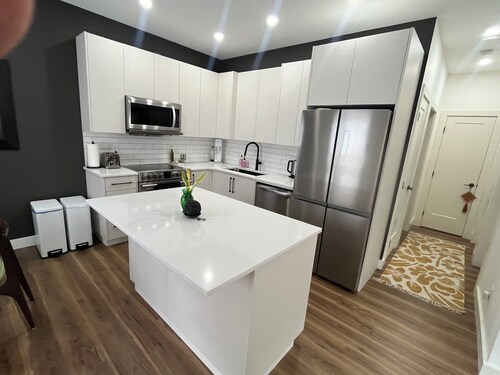 New & Stylish Carriage House in the Heart of town!