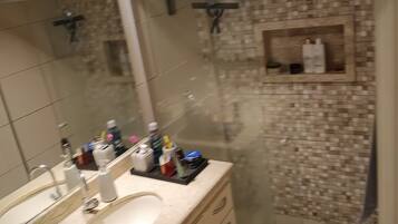 Shower, hair dryer, towels, soap
