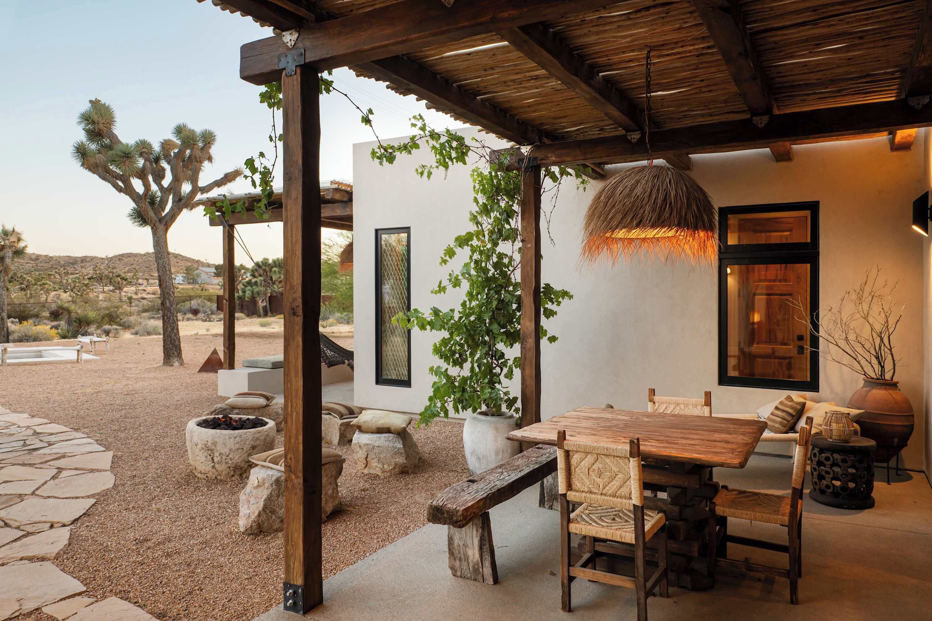 Shaded dining patio with rattan chairs