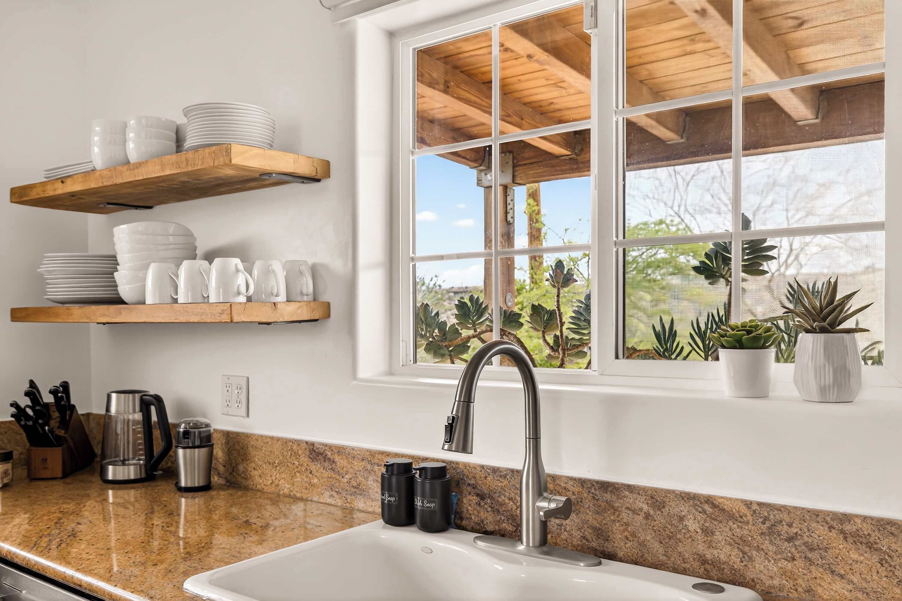 Kitchen sink with open shelves
