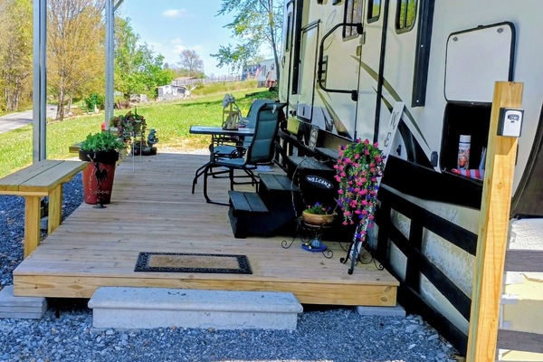 outdoor space, summer, huge front covered porch! plenty of seating.