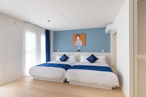Suite Supérieure, vue ville | Coffres-forts dans les chambres, fer et planche à repasser