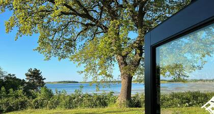 Ferienhaus mit Blick auf die Dalby Bay