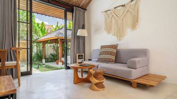 Luxury Villa, Pool View | Living area | 50-inch Smart TV with digital channels