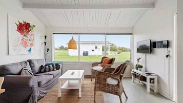 Comfort Apartment, Patio, Beach View | Living area