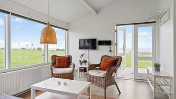 Comfort Apartment, Patio, Beach View | Living area