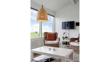 Comfort Apartment, Patio, Beach View | Living area