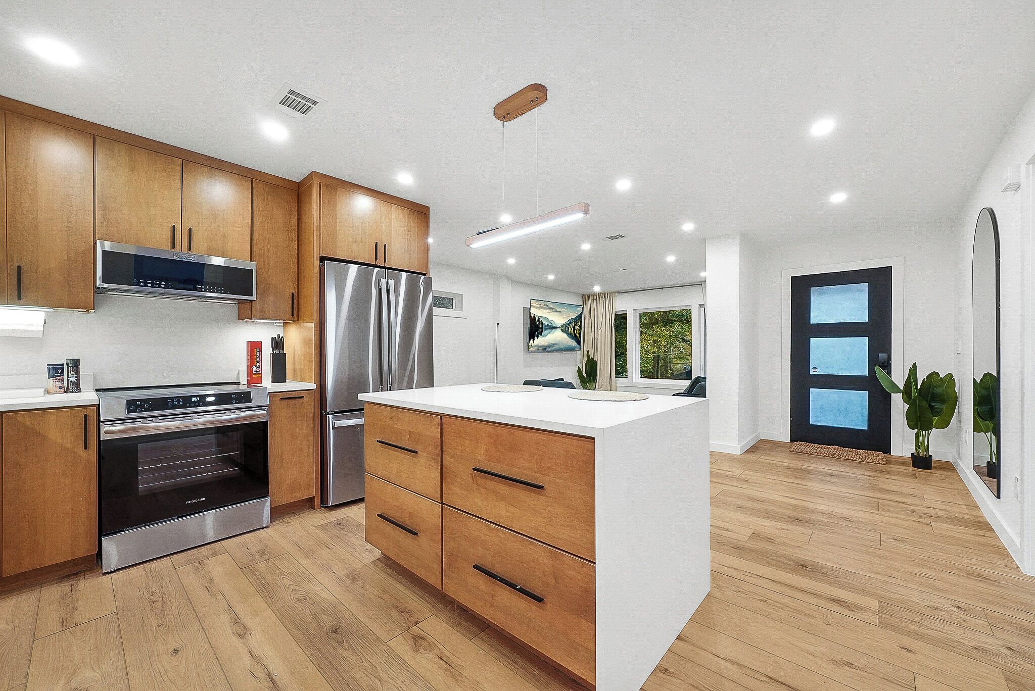 Upstairs main kitchen with coffee station and induction stove