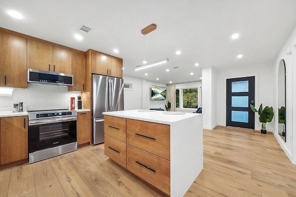 Upstairs main kitchen with coffee station and induction stove