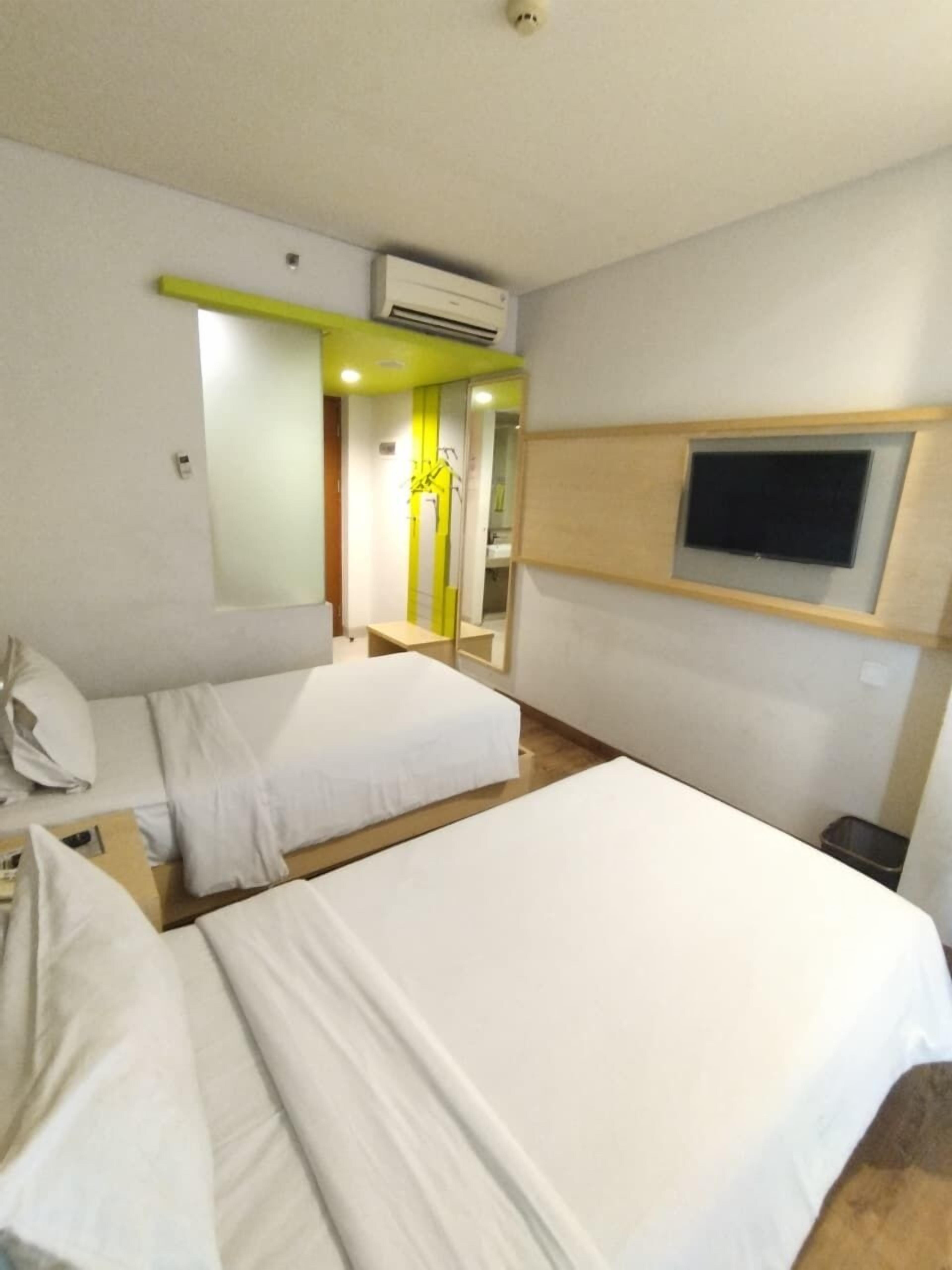 Quarto duplo superior, vista para a cidade | Escrivaninha, espaço de trabalho para notebook, Wi-Fi de cortesia
