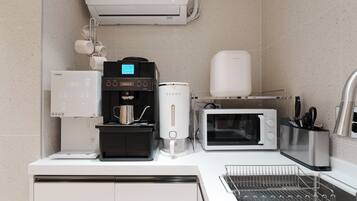 Mini-fridge, stovetop, toaster, cookware/dishes/utensils