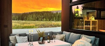 Modern cabin by the lake in Kvelia