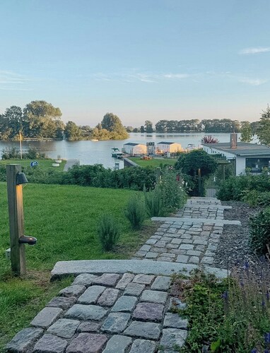 Riverside architect-designed garden apartment