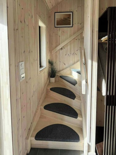 Newly built cabin on Andøya with northern lights