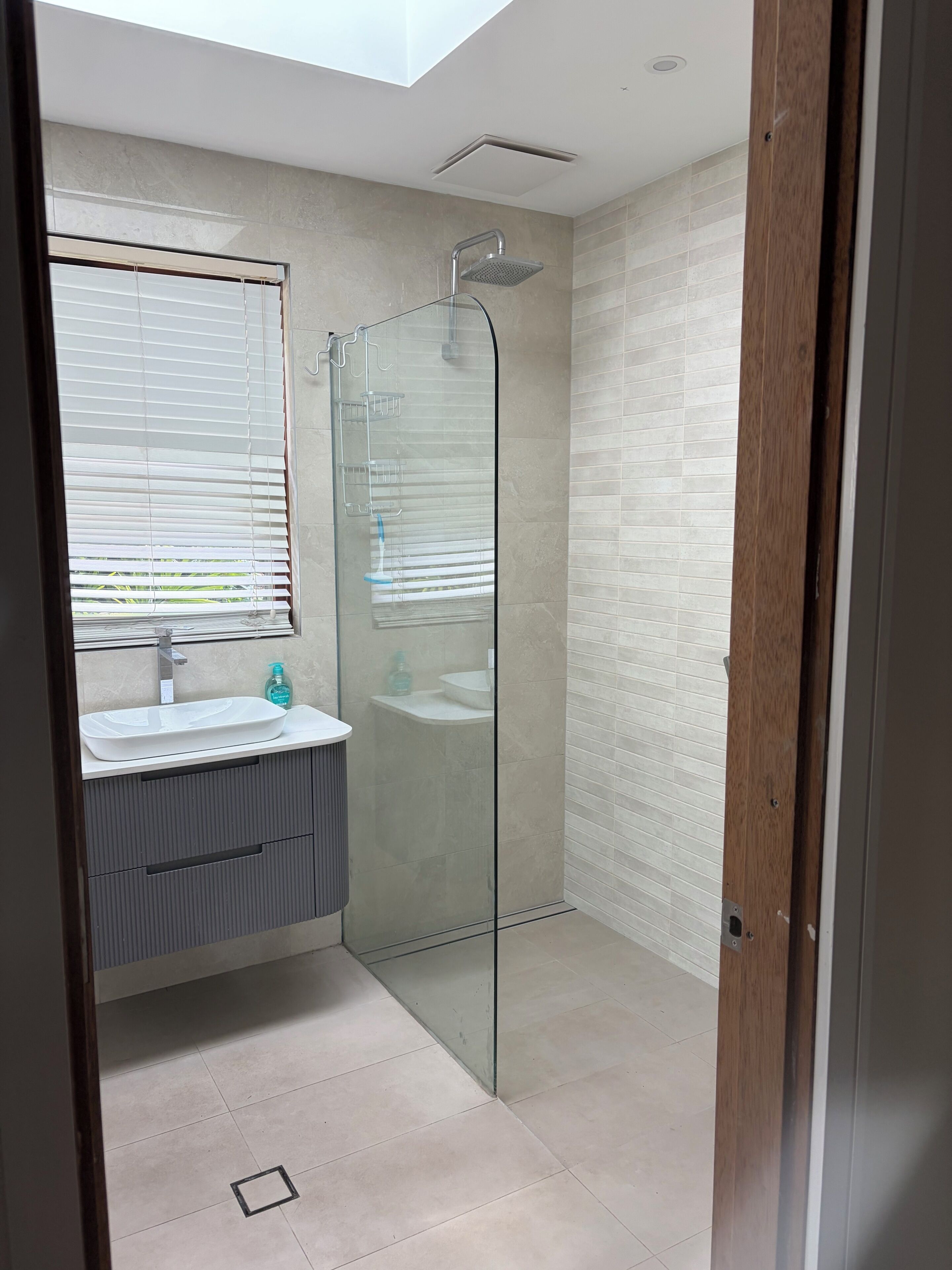 Shower, towels, soap, toilet paper