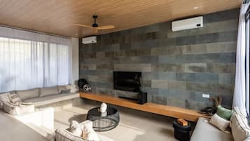 Luxury Villa, 3 Bedrooms, Private Pool | Living area | 50-inch Smart TV with digital channels