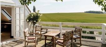 Ancienne maison de campagne avec vue sur les champs