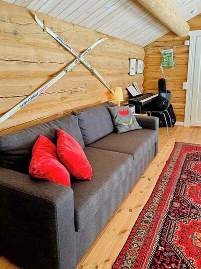 Hand-built log cabin by the lake in Vemdalen
