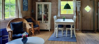 Blue cottage on idyllic Askø