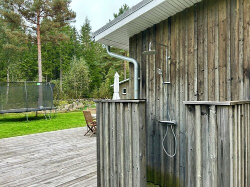 Modern peninsula cabin with panoramic view