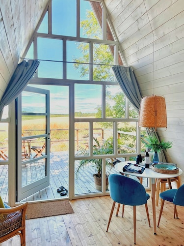 A-frame houses overlooking Öland's landscape