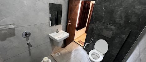 Shower, free toiletries, towels, soap