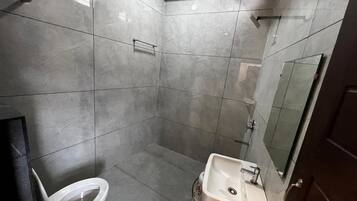 Shower, free toiletries, towels, soap