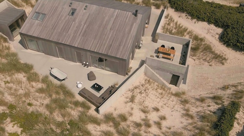 Architect-designed house in the first row of dunes