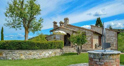 Appartement avec piscine dans une maison en pierre toscane près d'Asciano