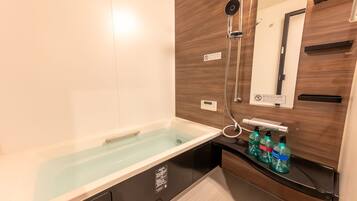 Villa | Bathroom | Separate tub and shower, free toiletries, hair dryer, towels