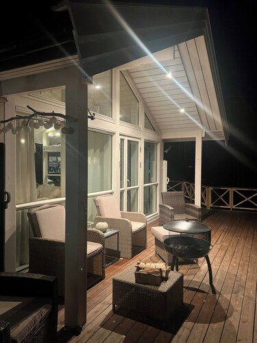 Northern lights view cabin with big veranda