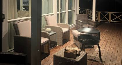 Northern lights view cabin with big veranda