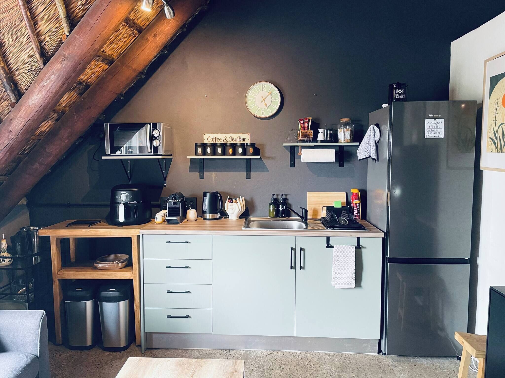Fridge, microwave, coffee/tea maker, toaster