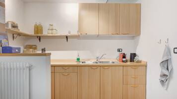 Fridge, coffee/tea maker, electric kettle, toaster